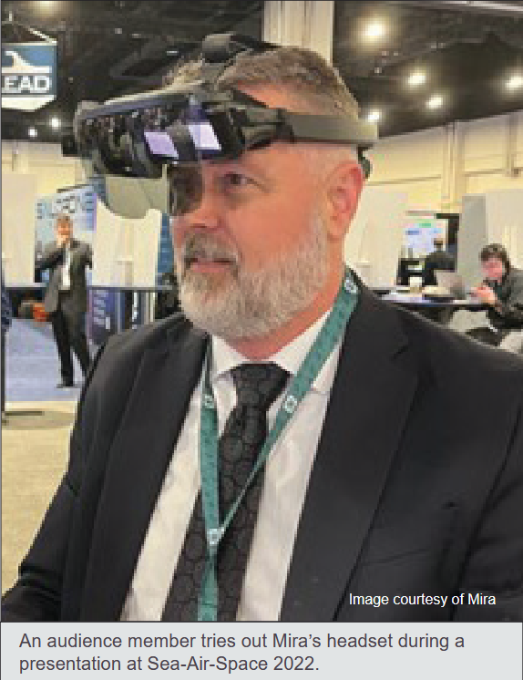 "An audience member tries out Mira's headset during a presentation at Sea-Air-Space 2022."